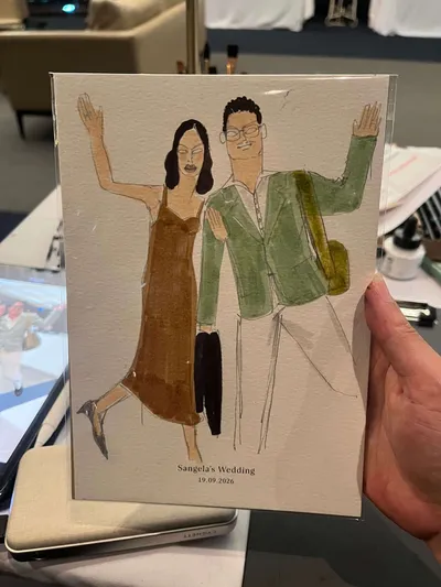 Watercolour and marker live guest sketch of a waving couple in a brown slip dress and green jacket, by Christine Pan