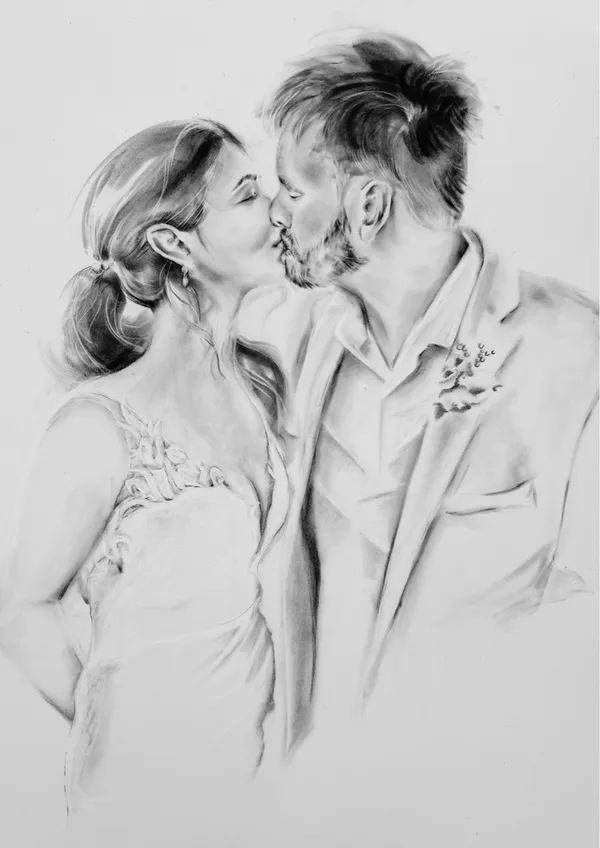 Charcoal portrait of a bride and groom sharing a kiss, drawn on white archival paper, by Ever After Art Co.